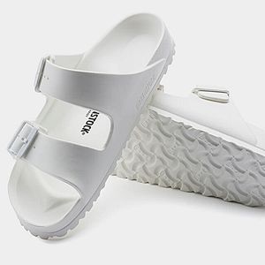 BIRKENSTOCK ARIZONA ESENTIALS, Size 7 and they are white.